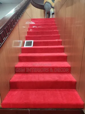 Wall to Wall Red Carpet Post Installation on Stairway
