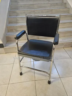 Quality Commode Chair With Backrest, Armrest and Footrest