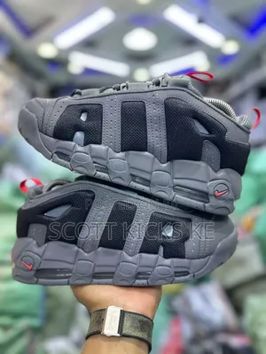 Nike Air More Uptempo Low Sneakers in a Dark Grey and Black