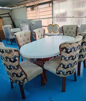 6-Seater Oval Dining Set Tufted Patterned Chairs