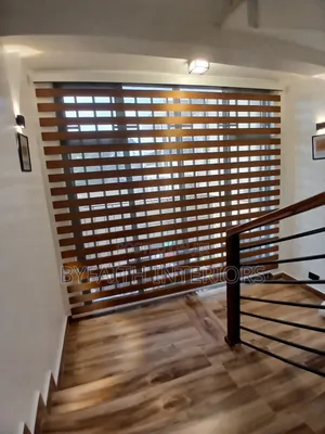 Brown Shade Roll Up Window Blind