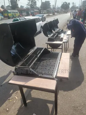 Barbeque Grill With Wooden Sides.