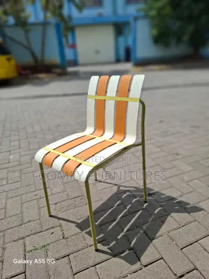 Vibrant Orange and White Slatted Accent Chairs