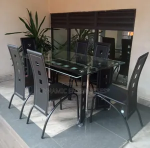 Executive 6 Sitter Glass Dinning Table With Leather Seat