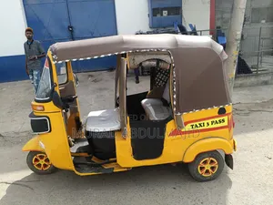 Bajaj RE 2022 Yellow