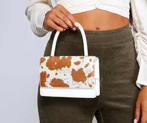 Elegant Cow Print Handbag – Classy Trendy