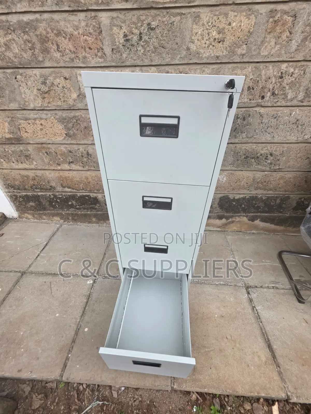 Lockable 4-Drawer File Cabinet.