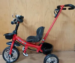 Children Ride on Tricycle