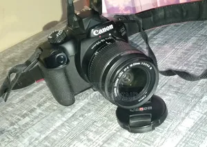Canon EOS 4000D DSLR Camera + 2 Batteries + Charger + Tripod