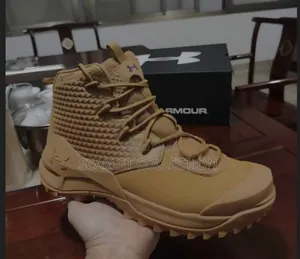 Under Armour Boots. Size 42 ONLY.