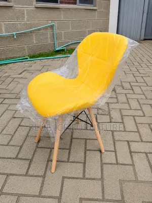 Yellow Padded Leather Eames Chair