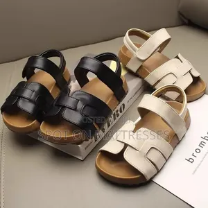 Kids' Modern Sandals. Sizes 26-36. Available in Cream and Black.