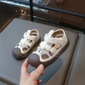 Cool Sandals for Kids! Available in Cream White and Black. Size 21-30.