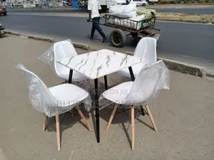 4 Seater Square Marble Dining Set With 4 White Eames Chair
