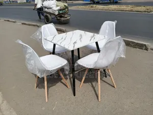 4 Seater Square Marble Dining Set With 4 White Eames Chair