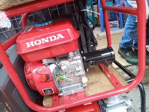 Honda Gasoline Engine Mounted on a Portable Concrete Vibrator