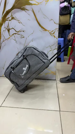 Grey Duffle Bags With Trolley Wheels