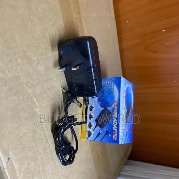 Universal AC/DC 12V 2A Adapter – Safe Power Supply Solution