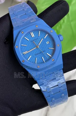 Swatch Dial and an Audemars Piguet Royal Oak With a Blue Finish