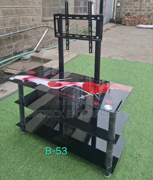 This 3-Tier Black Glass TV Stand With a Built-in Metal Mount Bracket