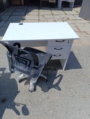 White Desk and Black Office Chair