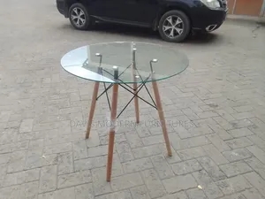 Glass -Top Dinning Table