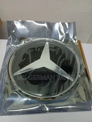 Genuine Mercedes Grille Star.