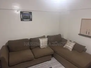 Brown L-Shaped Sofa