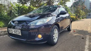 Mazda Demio 2009 Brown