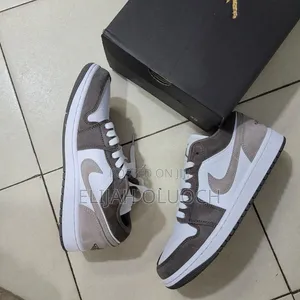 Nike Air Jordan 1 Low Sneakers in the "Olive Grey" Colorway,