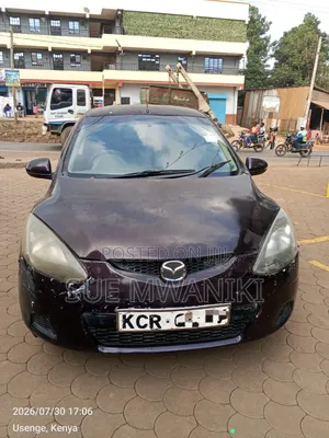 Mazda Demio 2012 Maroon