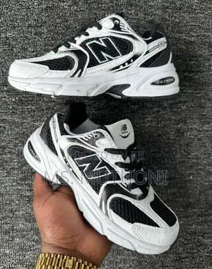 White / Black Kids New Balance 530! Size 31-35
