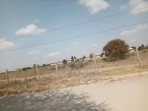 1/8 Plot Behind KAG University