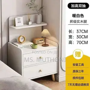 * Compact White Nightstand Featuring Dual-Drawer Storage
