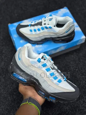 Nike Air Max 95 Sneakers in a "Laser Blue" or "Blue Spark" Colorway.