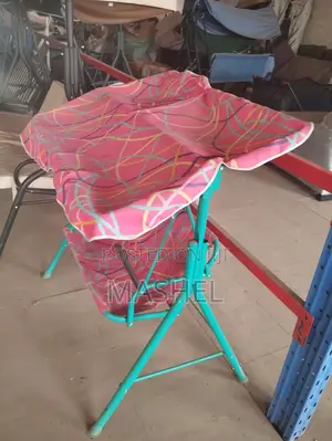 Kids Outdoor Double Swing Chair With a Sun Canopy.