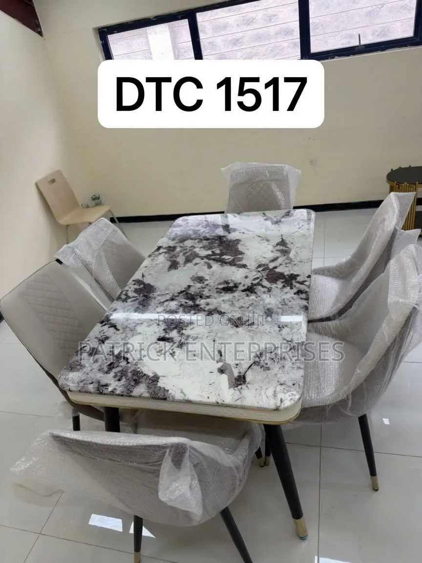 This Is a Classic Marble-Top Dining Set With 6 Leather Chairs,