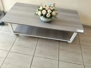 Modern Gray Coffee Table With White Metal Sled Base – Stylish Living