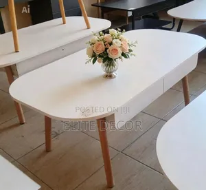 Scandinavian Oval White Coffee Table With Natural Wood Legs