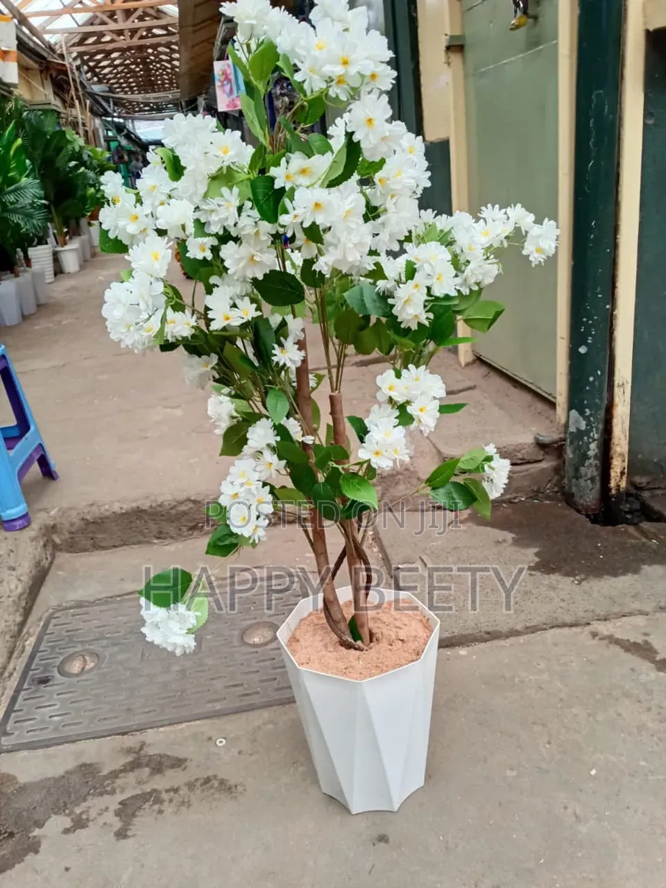 Beautiful Artificial Plants With White or Red Petals
