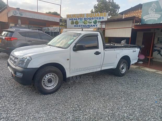 Isuzu Como 2014 White - thumbnail 6