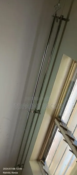 Silver and Bronze Adjustable Curtain Rods