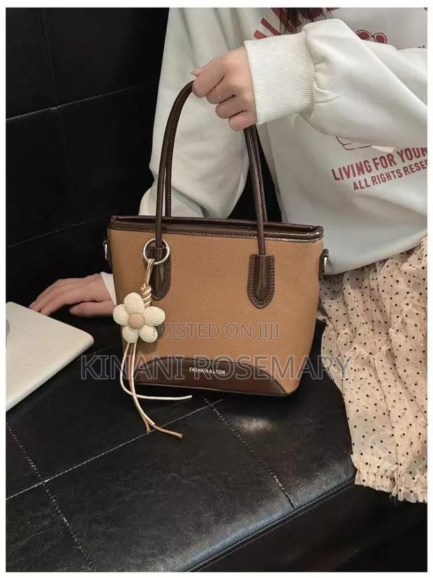Two-Tone PU Leather Tote Handbag With Flower Charm – Brown Coffee