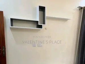 ​Modern Geometric Floating Wall Shelves – Stylish Living Room Decor