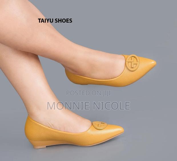 Trary Classy Yellow Closed Wedge Shoes - main view