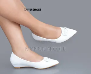 Trary Classy Yellow Closed Wedge Shoes