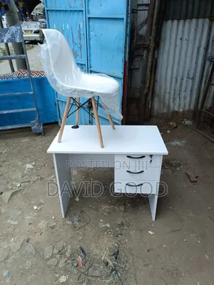 White Table and Eames Chair