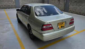 Nissan FB14 1998 Gold