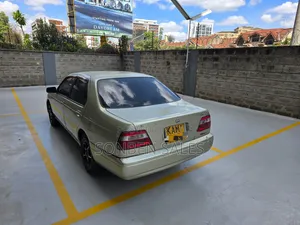 Nissan FB14 1998 Gold
