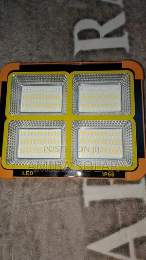 200 Watts Solar LED Flood Camping /Emergency Light and Phone Charger